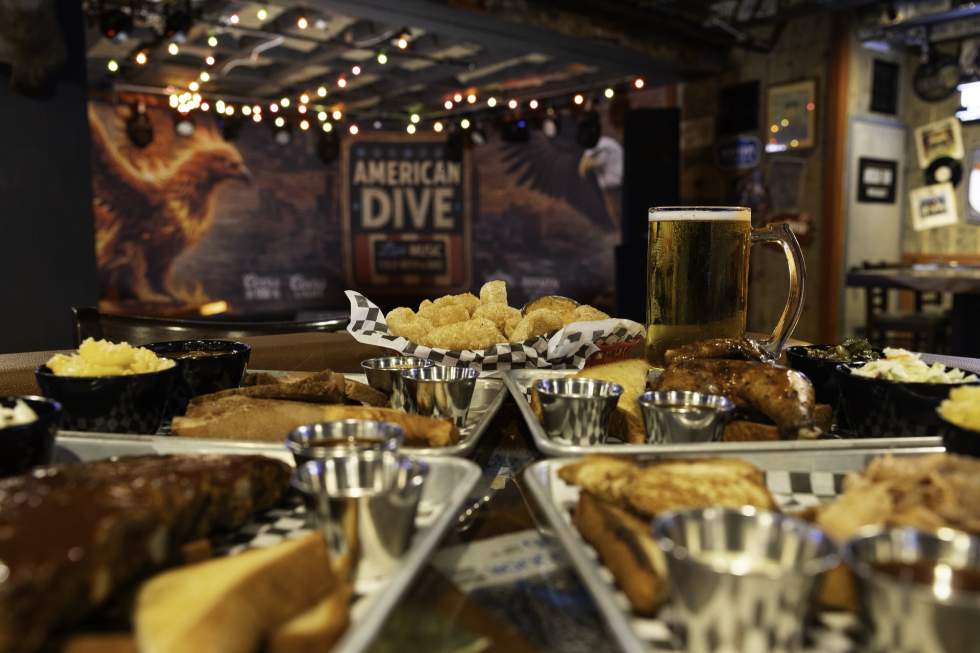 A spread of American Dive barbecue, sandwiches and sides