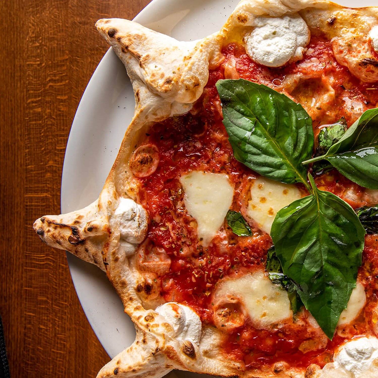 Neapolitan pizza with tomato, mozzarella and fresh basil at Red Phone Booth