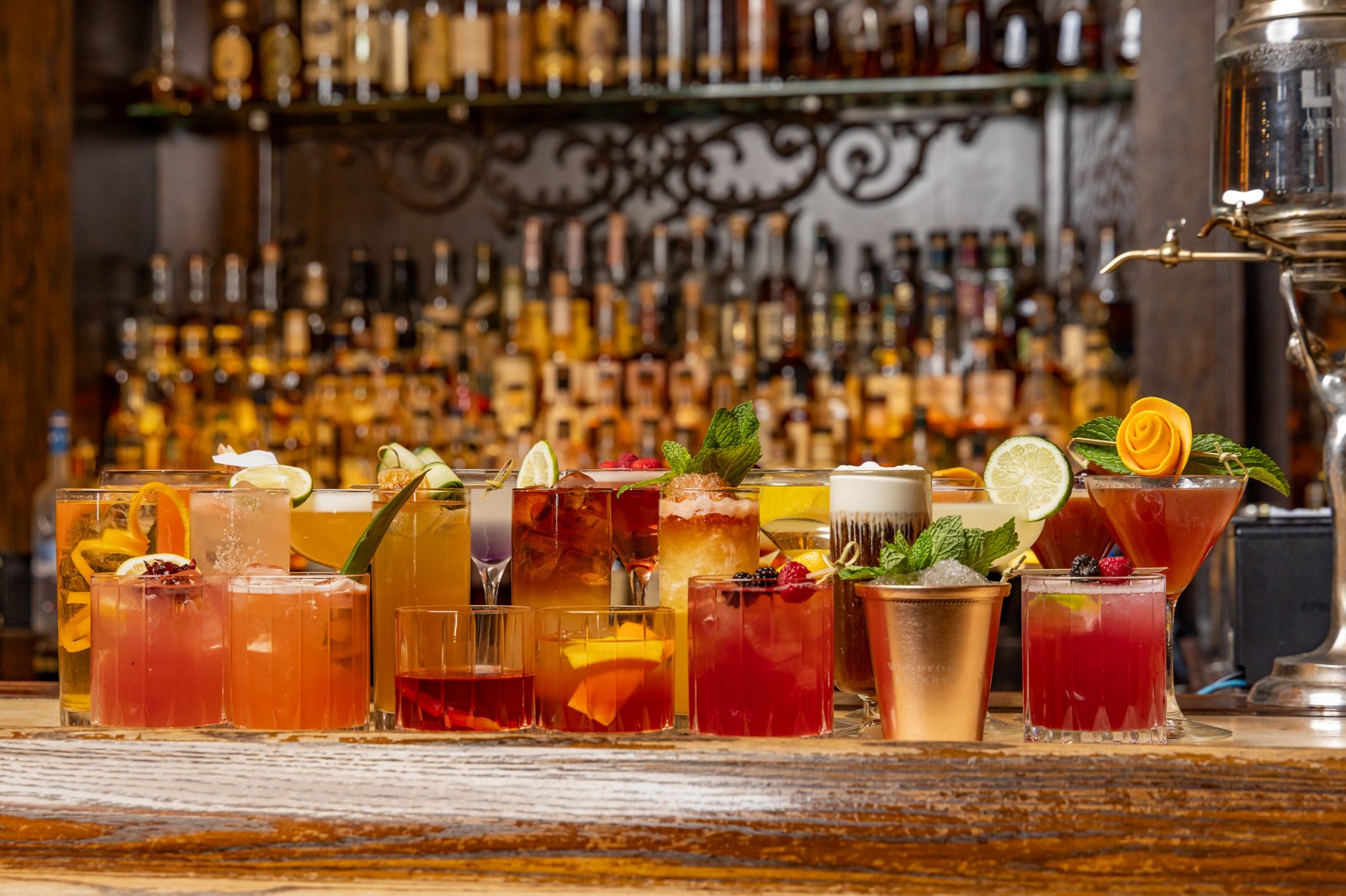 A colorful selection of cocktails across the Red Phone Booth bar