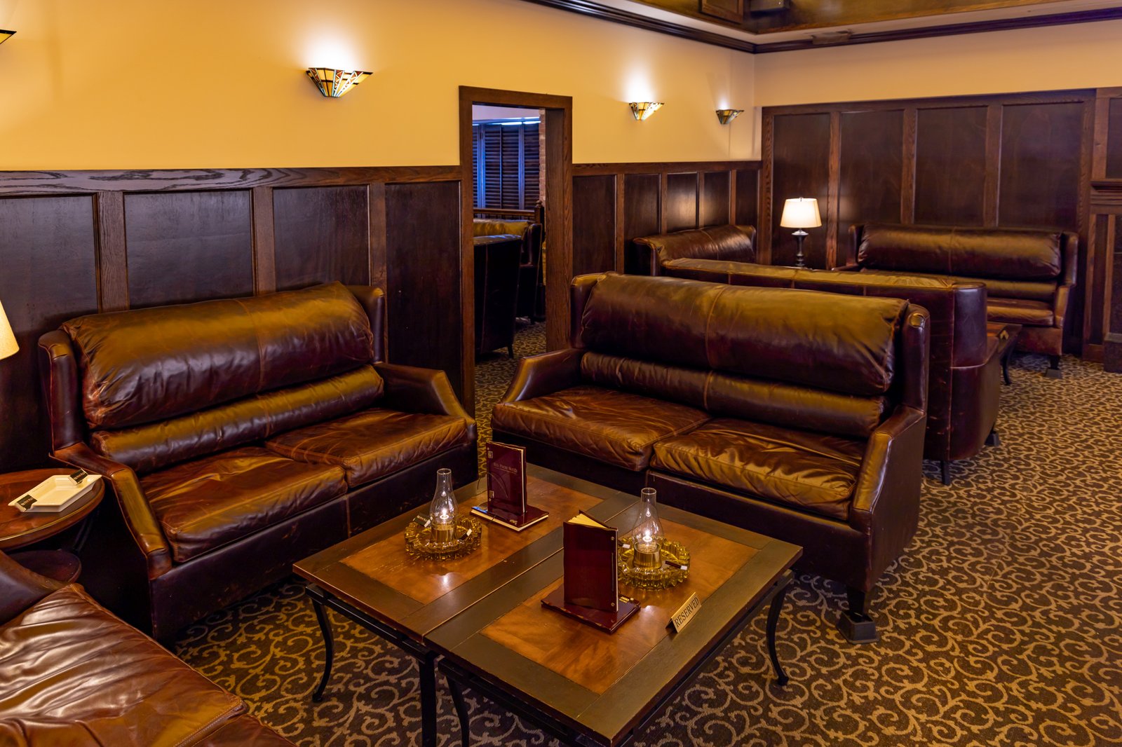 Leather lounge seating inside Red Phone Booth